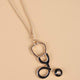 Black Stethoscope Necklace with Gold Accents for Healthcare Professionals