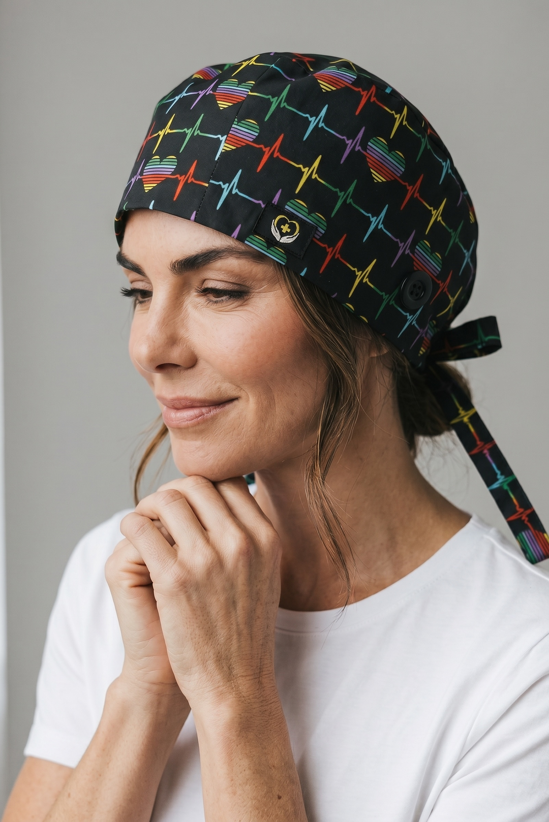 Tie-back scrub caps with adjustable fit and ear saver buttons at Scrubs Galore Uniforms