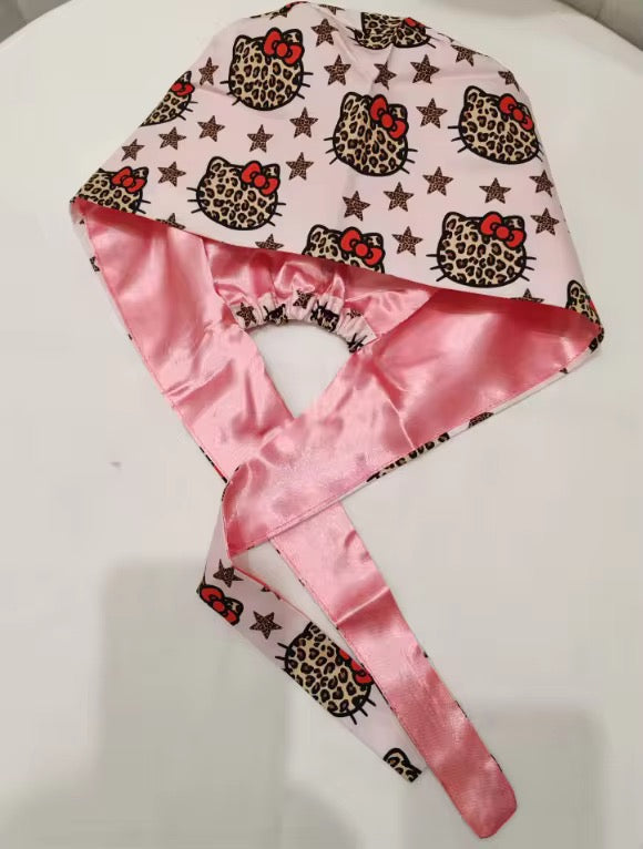 Satin-lined scrub caps for nurses at Scrubs Galore Uniforms with frizz protection and bold prints