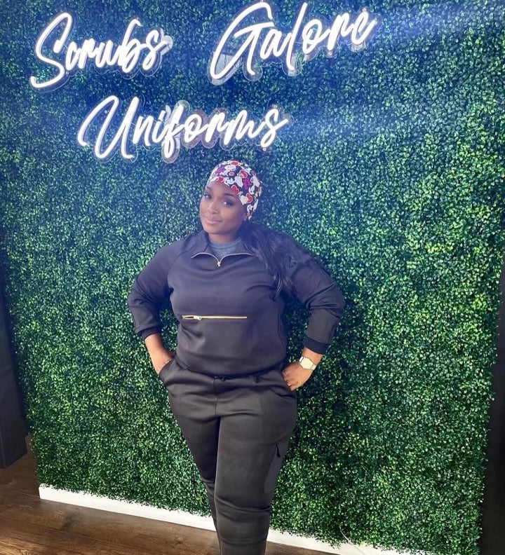 Healthcare professional in black scrubs at Scrubs Galore Uniforms