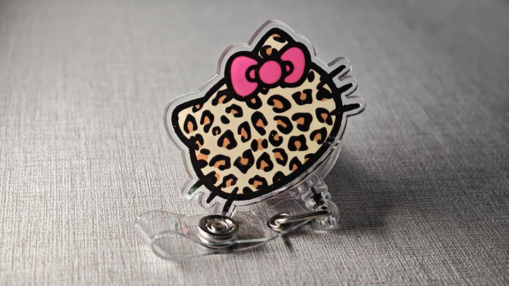 Leopard Bow Badge Reel