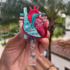 Carrete de credencial retráctil con diagrama anatómico del corazón