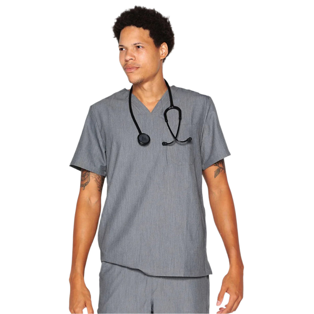 Person wearing gray medical scrubs with a stethoscope on a white background
