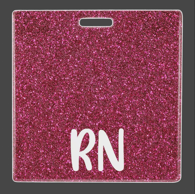 Insignia con brillantina "RN"