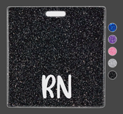 Insignia con brillantina "RN"