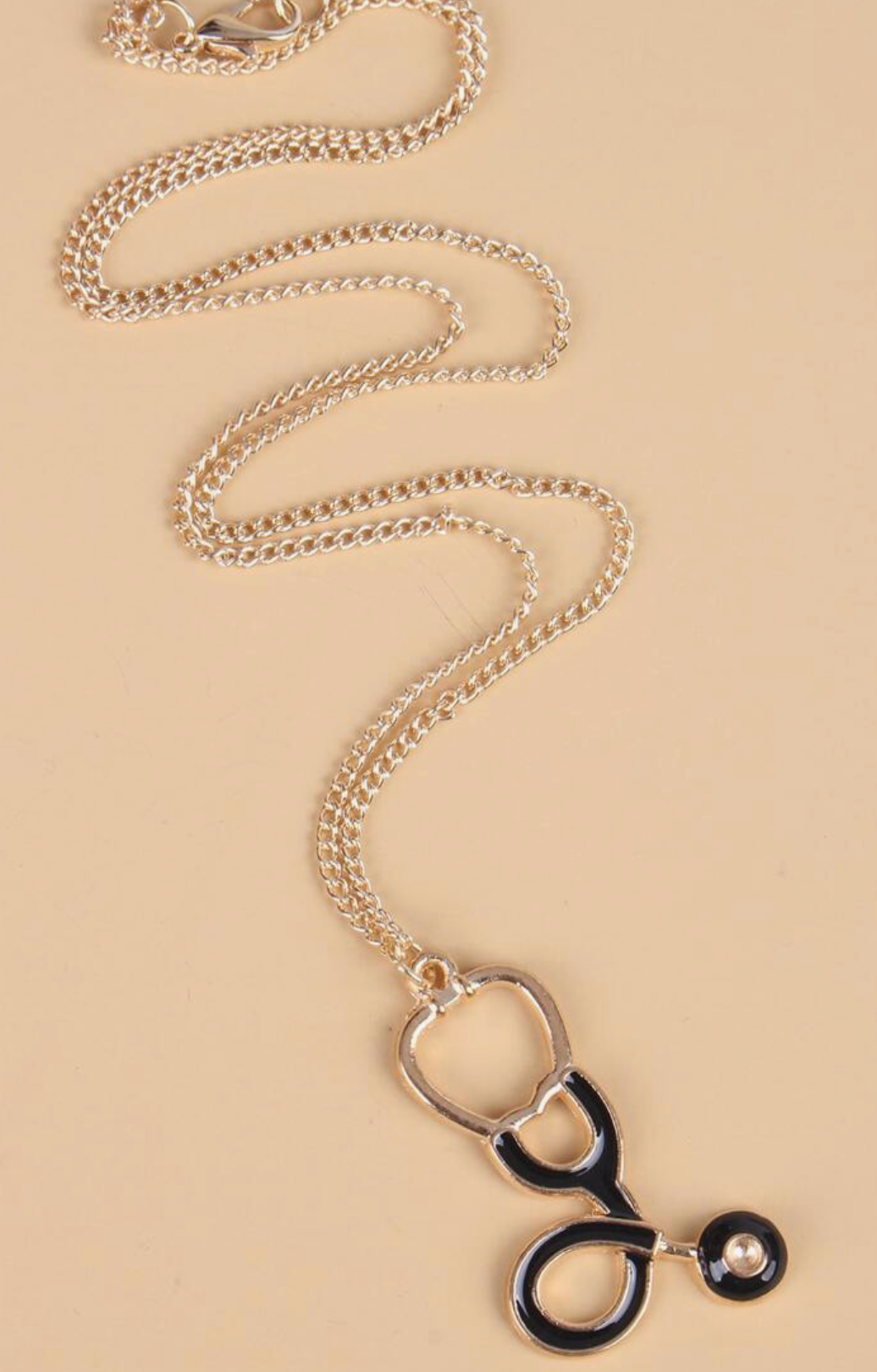 Black Stethoscope Necklace with Gold Accents for Healthcare Professionals