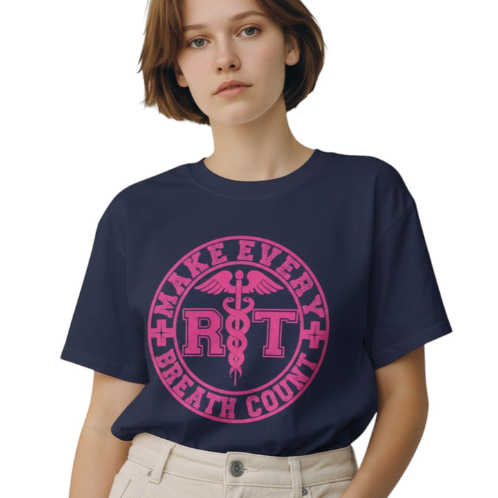 Scrubs Galore Uniforms navy blue 100% cotton RT tee with pink "Make Every Breath Count" graphic. Short sleeves, crew neck.