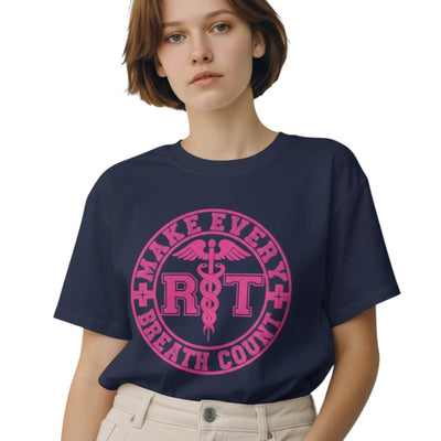 Scrubs Galore Uniforms navy blue 100% cotton RT tee with pink "Make Every Breath Count" graphic. Short sleeves, crew neck.